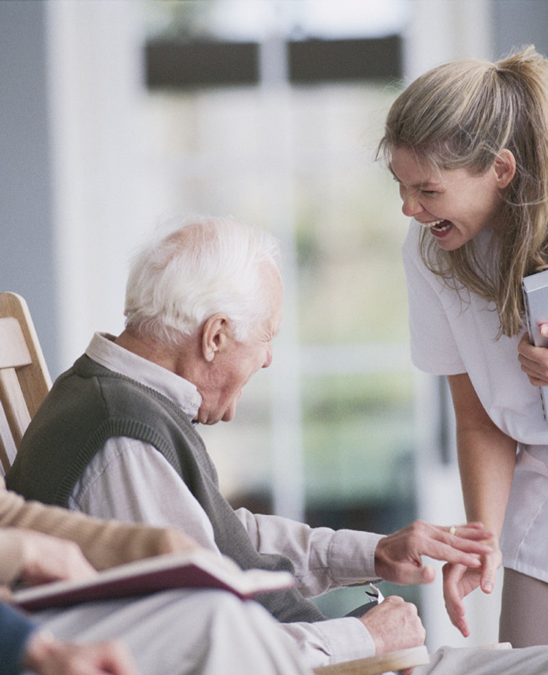 Care manager with an elderly client